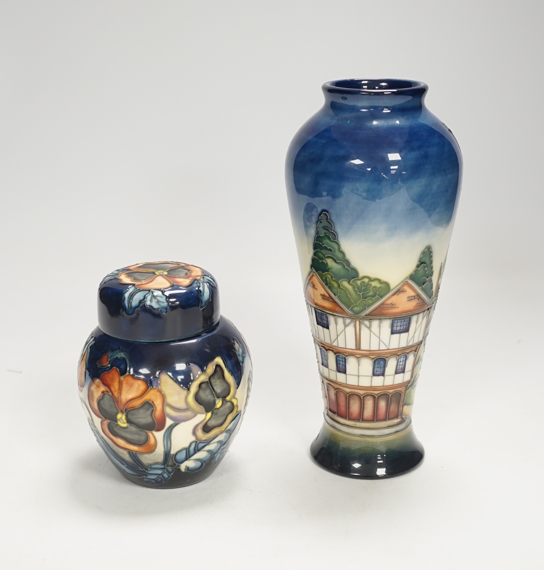 A Moorcroft Pansy ginger jar by Sally Guy, limited edition 18/100 and a Moorcroft ‘Thaxted’ limited edition vase by Philip Gibson, 123/200, largest 20cm high